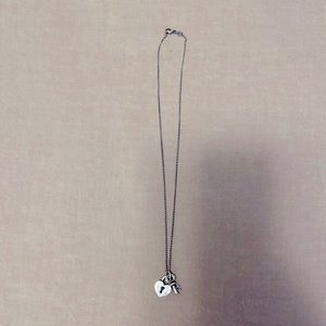 James avery sterling silver necklace with heart and key locket charm.
